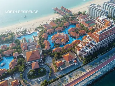 an aerial view of a resort at the beach at Picture-Perfect 2BR apartment with Burj View in Dubai