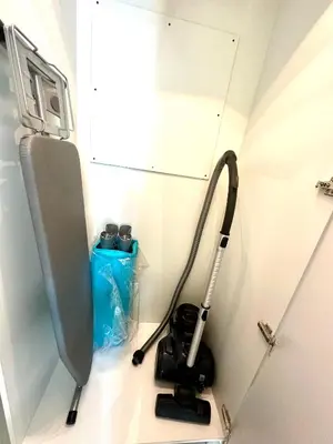 a mop in a corner of a room at Stunning Studio with Sea-View in Jumeirah Lake Towers JLT in Dubai