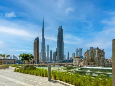 a view of a city skyline with tall buildings at The Cinema Suite Luxury 2-Bed Near Dubai Mall in Dubai
