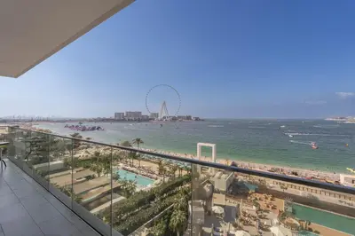 a view of the beach and the ferris wheel at Beautiful 2 Bedroom Sea Views at La Vie JBR in Dubai