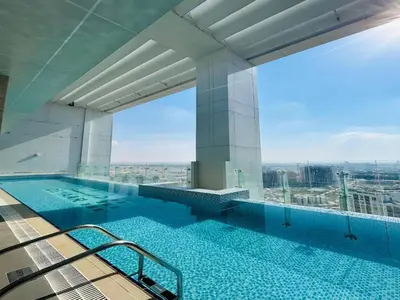 a swimming pool on the top of a building at MontRose residence Tower A 1BR Apartment in Dubai