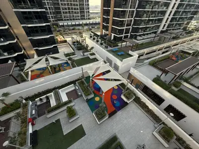 an aerial view of a city with buildings at Cozy 01 BHK with Balcony in Dubai