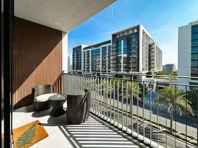 a balcony with a view of a city at Elegant 3 Bed in Park Point, Dubai Hills Estate in Dubai