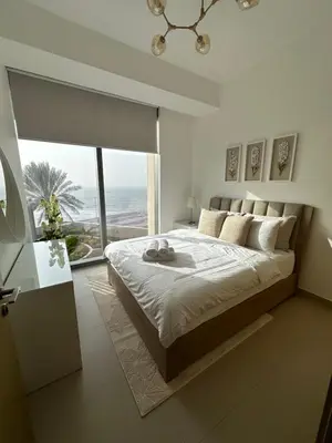 a bedroom with a large bed and a large window at Sea View Luxury 5242 Marina JBR Beach 5mins in Dubai