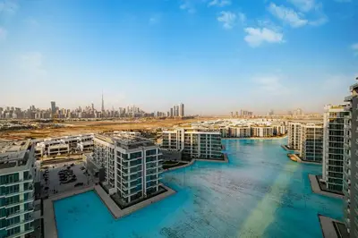 an aerial view of a city with tall buildings at Luxury 2BR Prime Location & Burj Views in Dubai