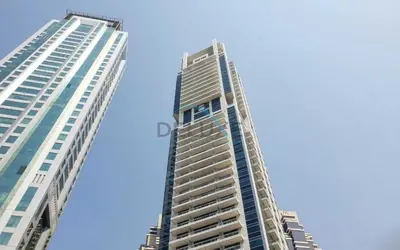 two tall buildings are next to each other at Spectacular 1BR in Botanica Tower 1 Dubai Marina by Deluxe Holidy Homes in Dubai