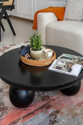a black coffee table in a living room at Frank Porter - Urban Oasis in Dubai