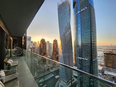 a view of a city skyline from a skyscraper at SOLARTE Luxe - Marina Gate - Spectacular Pools with Marina Views in Dubai