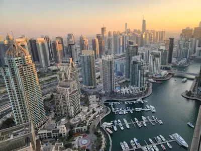 an aerial view of a city with a harbor at SOLARTE Luxe - Marina Gate - Spectacular Pools with Marina Views in Dubai