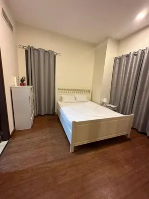 a bedroom with a bed in a room with curtains at Master room in Jumeira Beach Residence - JBR in Dubai