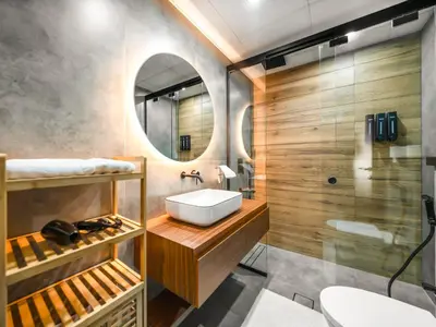 a bathroom with a sink and a shower at Luxury 2BR Apartment with Full Marina Views in Dubai