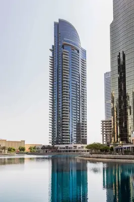 a city skyline with tall buildings and a body of water at Signature Studio JLT in Dubai