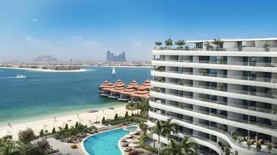 a view of the beach and a building at Azizi Mina in Dubai