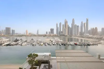 a view of a harbor with boats in a city at Silkhaus Seaside 2BDR in Marina Vista Beachfront in Dubai