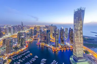 an aerial view of a large city at night at One bed apartment at a great location in Dubai Marina in Dubai