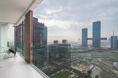 a view of a city from a building balcony at Frank Porter - Park Gate in Dubai