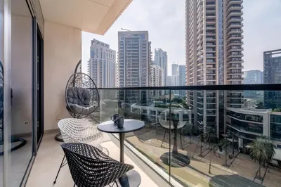a balcony with chairs and a view of a city at GuestReady - Charming retreat in Downtown Dubai in Dubai