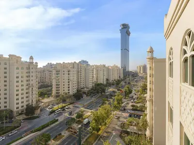 a view of a city with tall buildings at Short-stay at Al Haseer - 4 Beds Palm Holiday Apt in Dubai