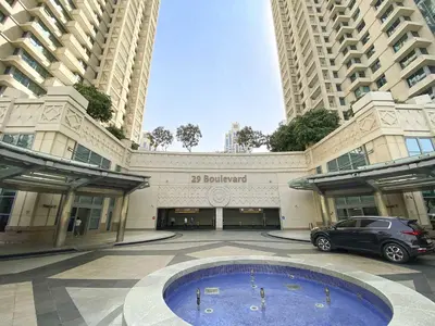 a building with a car parked in front of it at Silkhaus 1BR Downtown Heart in Emaar Tower in Dubai