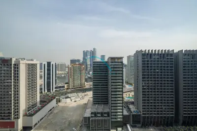 a view of a city with tall buildings at Tranquil 1BR in Burj Views Tower B, Downtown by Deluxe Holiday Homes in Dubai