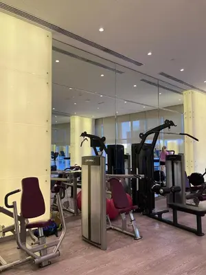 a gym with several exercise bikes in a room at Sea View, Easy Access, Close to All Amenities in Dubai