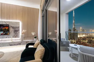 a living room with a view of a city at Full Burj Khalifa View, TOP Floor, 5min Dubai Mall in Dubai