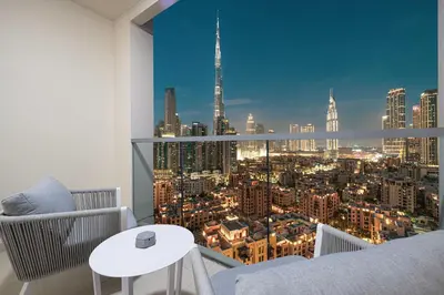 a room with a view of a city skyline at Full Burj Khalifa View, TOP Floor, 5min Dubai Mall in Dubai