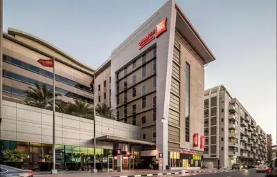 a large building on the corner of a street at City Stay Partition Room in al Barsha 1 Near Metro in Dubai