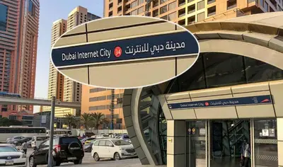 a building with a sign on the side of it at Bagpack Double Partition Room in Tecom Near Metro in Dubai