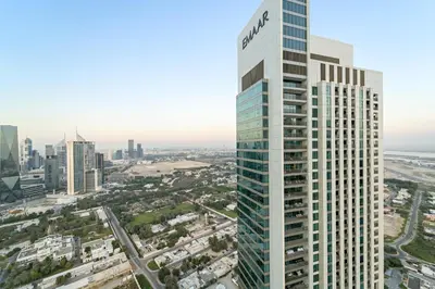 an aerial view of a tall building in a city at Elegant 2BR in Downtown Dubai l Walk to Dubai Mall in Dubai