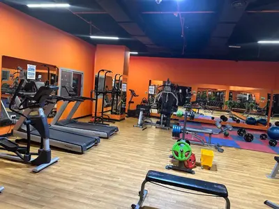 a gym with several treadmills and exercise machines at Studio Apartment- Dubai Marina in Dubai
