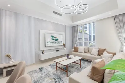 a living room with a couch and a table at Heaven Crest Vacation Homes Downtown - 3 Bedroom Suites 2 minute walk to Dubai Mall and Burj Khalifa in Dubai