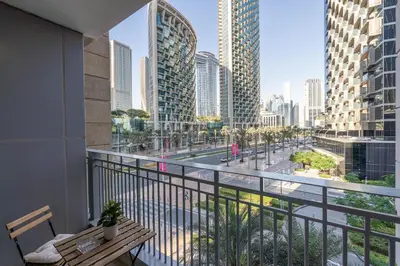 a balcony with a view of a city at Sophisticated and Elegant 2BR in Downntown Dubai in Dubai