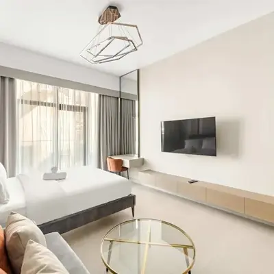 High-end studio with rooftop pool and gym