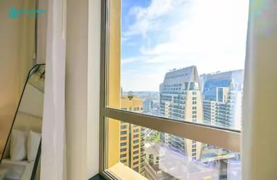 a view from a window of a city at Blue Breeze - Elegant 3BR Apt with Panoramic Marina Views in JBR in Dubai