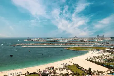 an aerial view of a beach and the ocean at FIRST CLASS 2BR Breathtaking Beach Views in Dubai