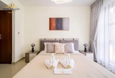 a bedroom with a bed with shoes on it at Chic 1-Bedroom Haven in Standpoint A Tower, Downtown Dubai in Dubai