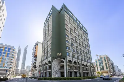 a rendering of a building in a city at Mood Living 22 in Dubai