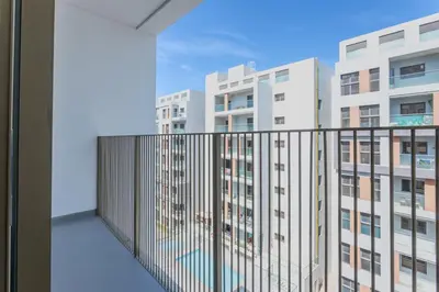 an apartment balcony with a view of buildings at Mood Living 45 in Dubai
