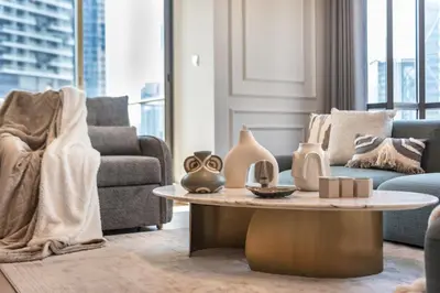 a living room with a couch and a coffee table at The Smart Concierge - Southridge 1 in Dubai