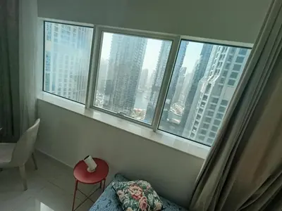 a room with a view of a city from a window at In the heart of Dubai in Dubai