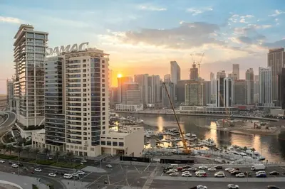 a view of a city skyline with buildings at Elegant 2BR with Balcony and Burj Khalifa Skyline Views in Dubai