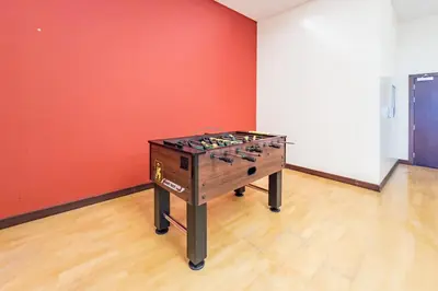 an empty room with a table in the middle of it at Upgraded 1BR Overlooking Palm Jumeirah & Sea Views from Living to Bedroom, Elite Residence, Dubai Marina by Deluxe Holiday Homes in Dubai