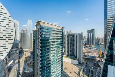 a view of a city skyline with tall buildings at LUX 2BR in Missoni Tower - 5 mins to Burj Khalifa in Dubai