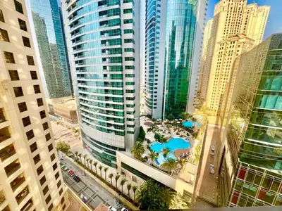 an aerial view of a city with tall buildings at Bahar 6 in Dubai