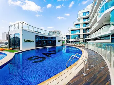 a swimming pool on the deck of a cruise ship at Arjan Bright Studio w Resort Amenities Samana PV by Vibel in Dubai