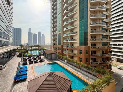 an overhead view of a swimming pool in a city at Frank Porter - Marina Park in Dubai