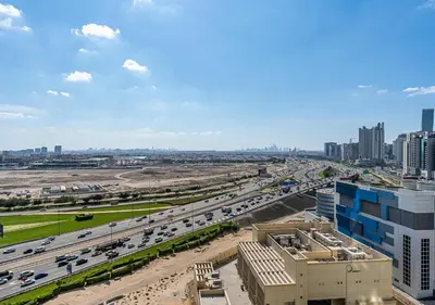 an overhead view of a highway in a city at 2BR Central Apt in Business Bay Noble Tower in Dubai