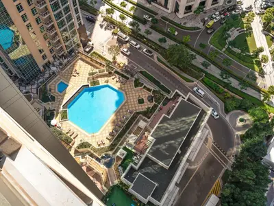 an overhead view of a pool in a city at WonderfulStay at The Residences - Best Burj Khalifa & Fountain View - Brand New Luxury Apartments in Dubai