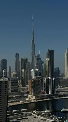 a view of a city skyline with a tall skyscraper at Upside living business bay best in Dubai